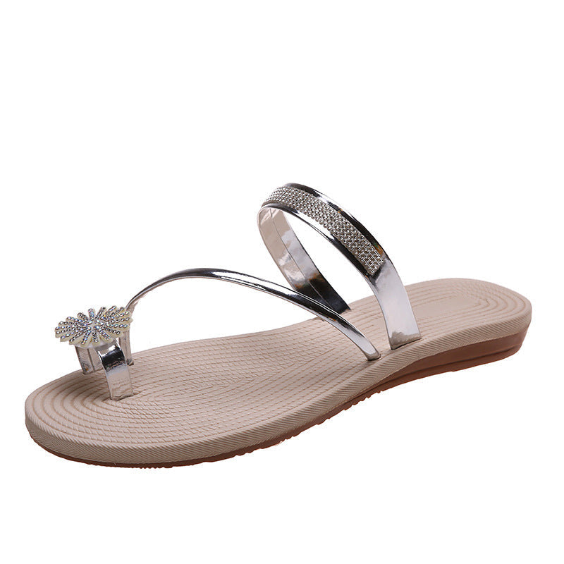Sandalias planas con strass glanzende