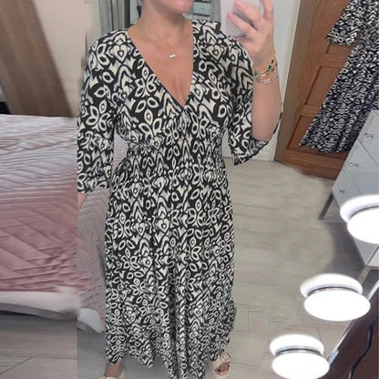 V-hals bedrukte jurk met wijde mouwen