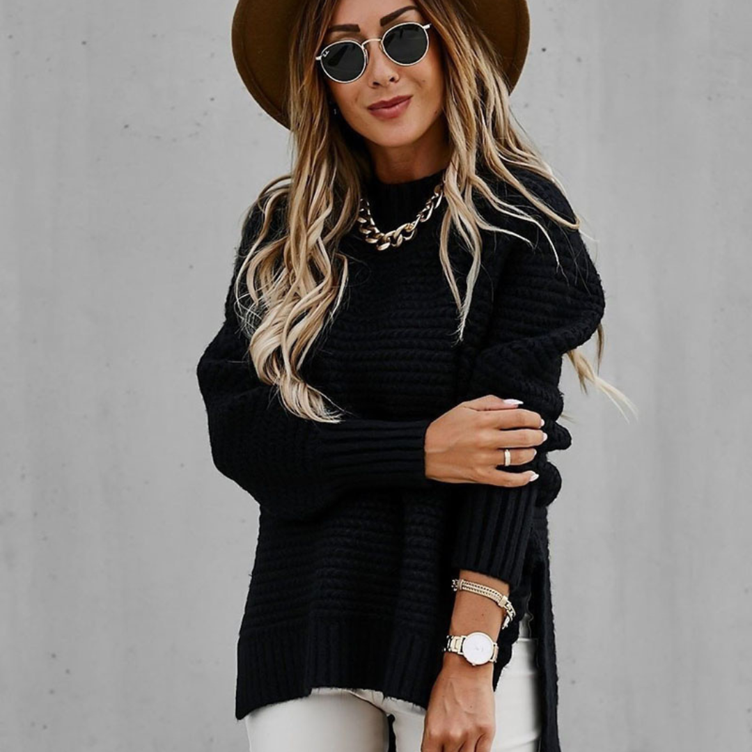 Long knitted sweater with openings