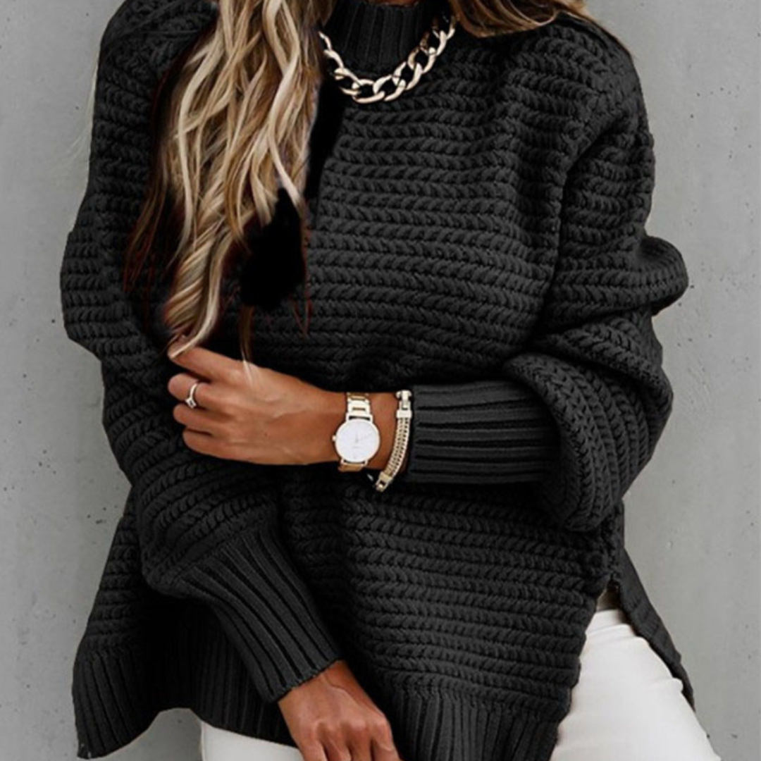 Long knitted sweater with openings