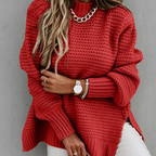 Long knitted sweater with openings