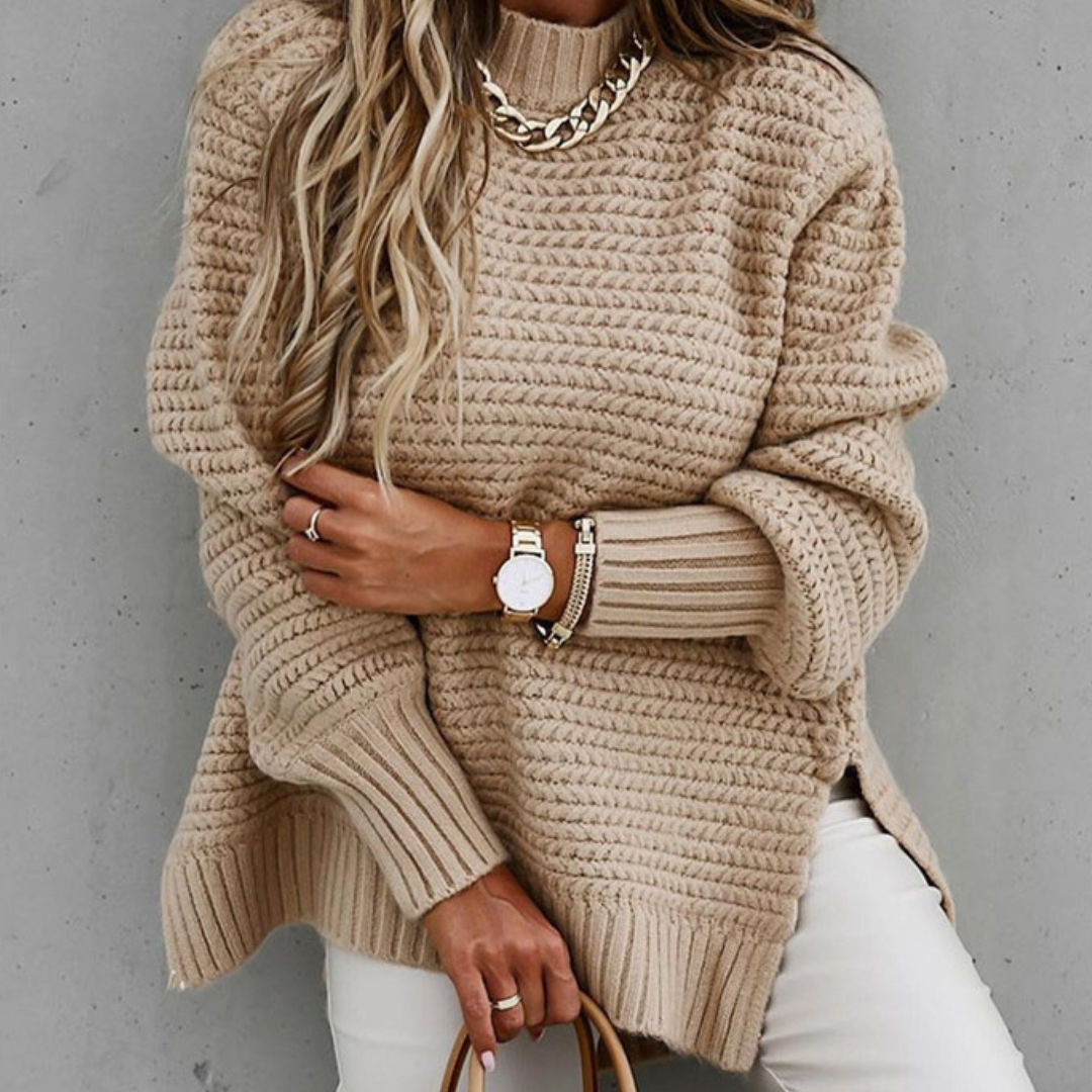 Long knitted sweater with openings