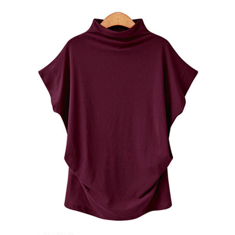 Camiseta de cuello alto con mangas abullonadas.
