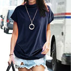 Camiseta de cuello alto con mangas abullonadas.