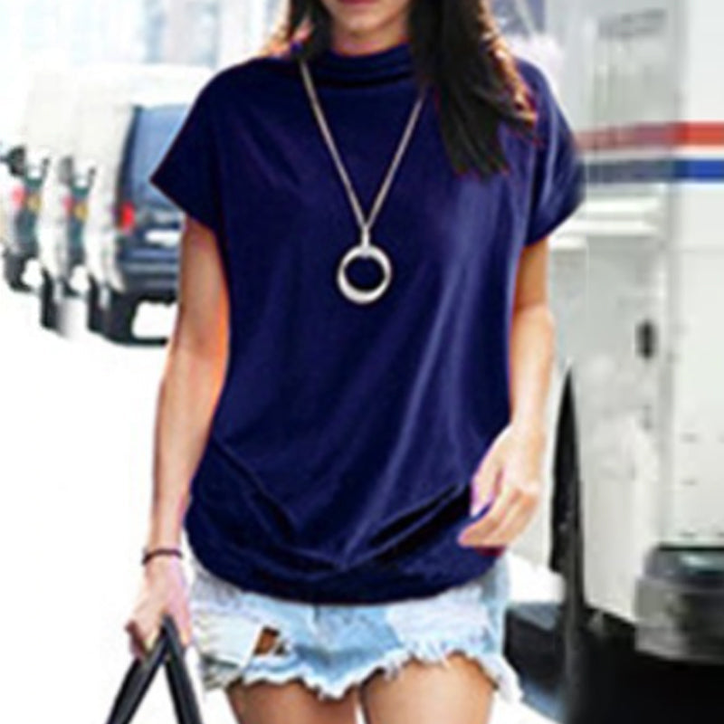 Camiseta de cuello alto con mangas abullonadas.